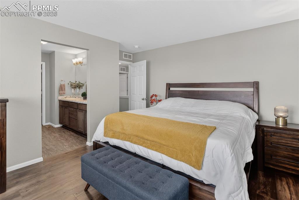 Image 19 of 40: Master Bedroom