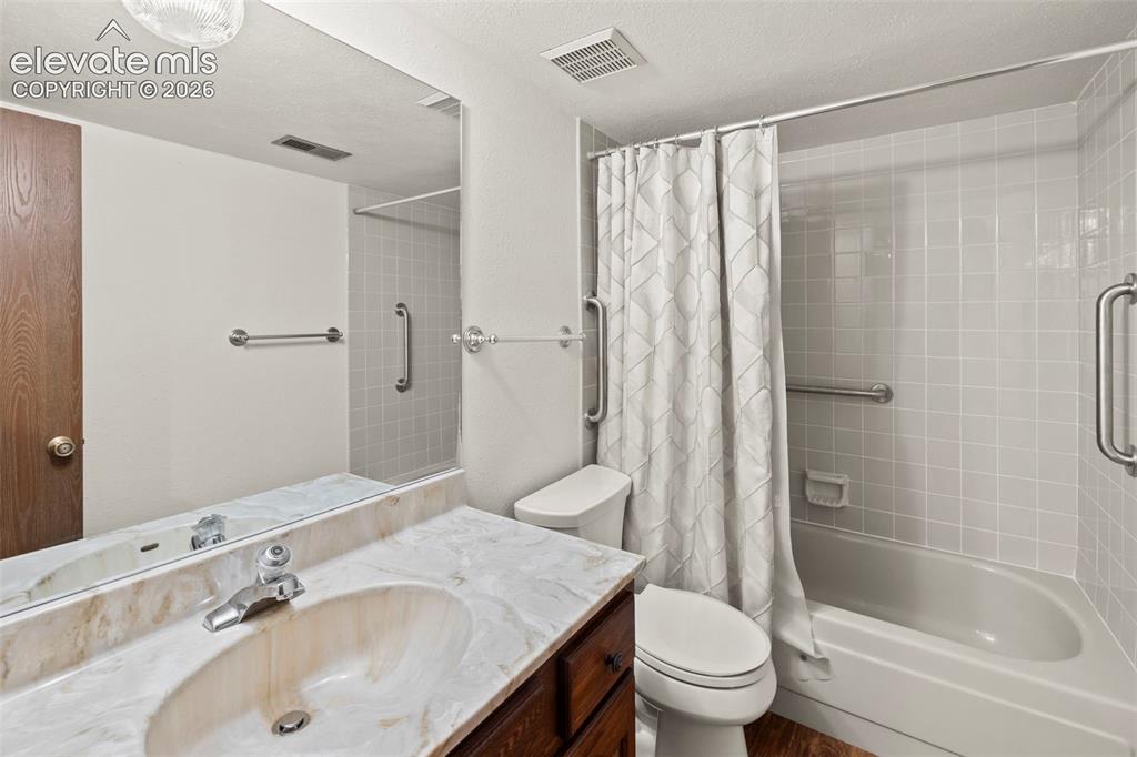 Image 21 of 30: Lower level bathroom
