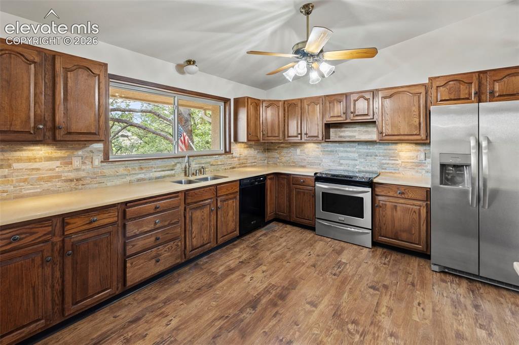 Image 3 of 30: An abundance of cabinets and stainless steel appliances