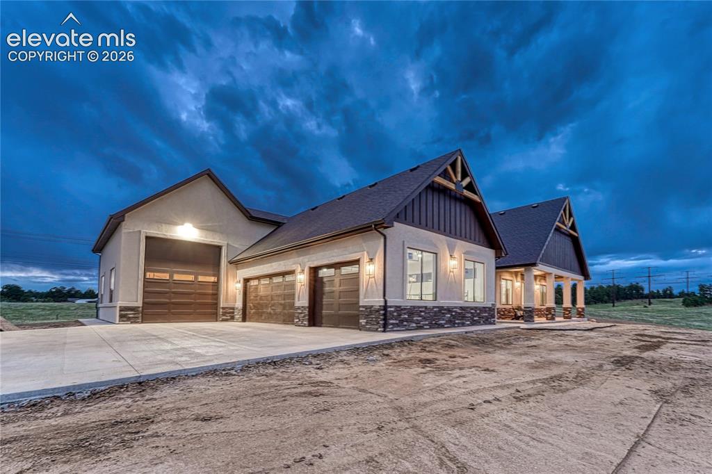 Image 2 of 50: Two distinct living spaces and 4-car with dedicated RV garage.