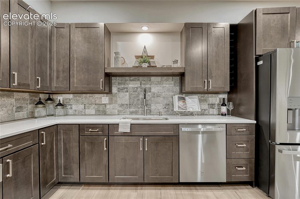 Image 39 of 49: ...tile backsplash...