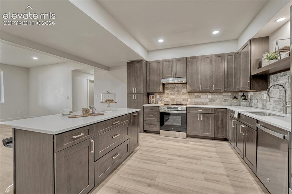 Image 40 of 49: ...and stainless steel appliances.