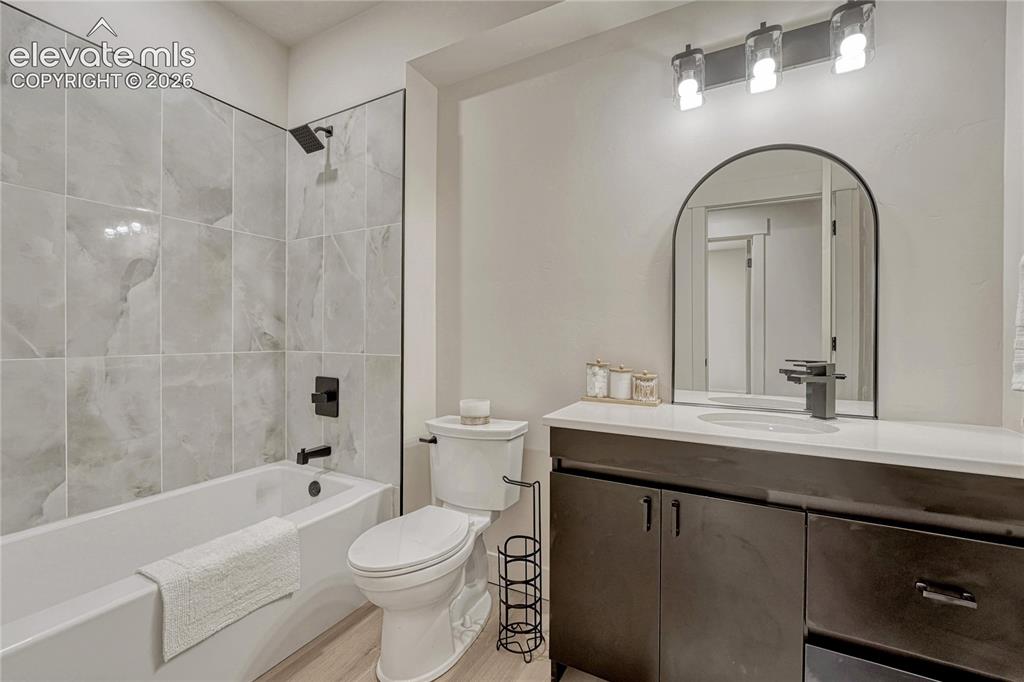 Image 45 of 49: Full lower level bath.