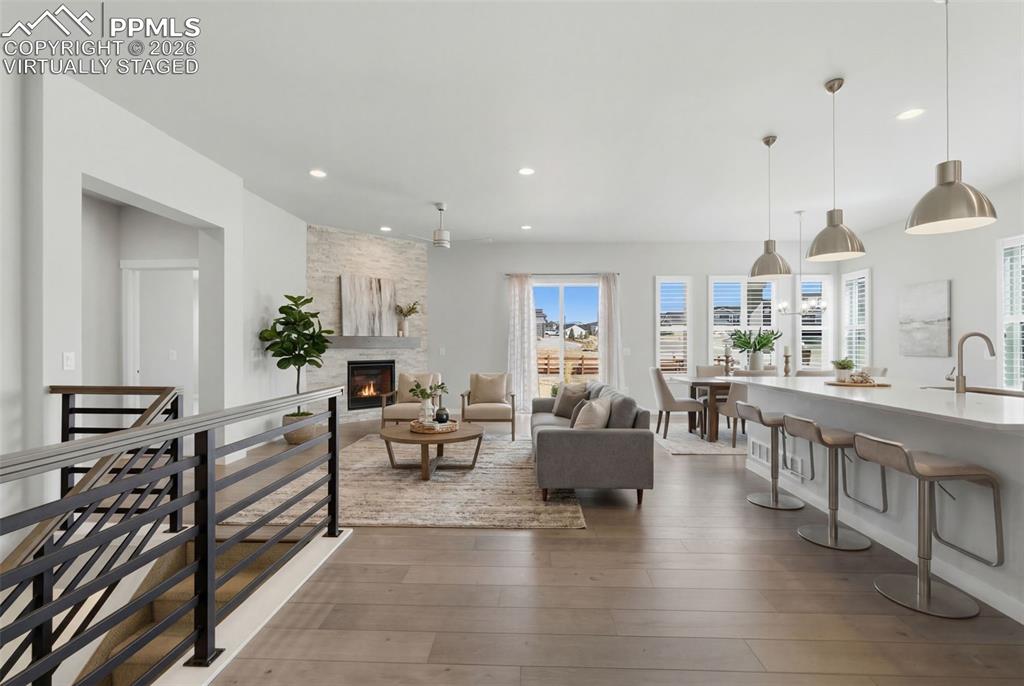 Image 3 of 48: Virtually staged - Spacious open-concept living room with soaring ceilings,