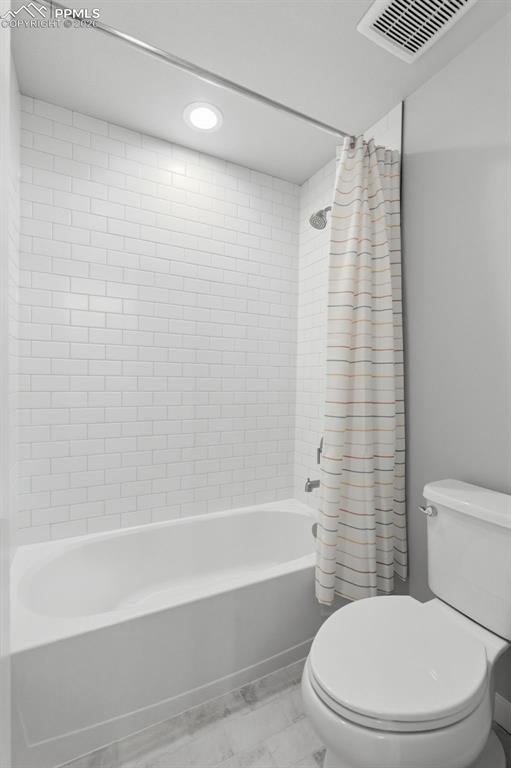 Image 33 of 48: Full basement bathroom with tub/shower, vanity, and toilet - convenient for