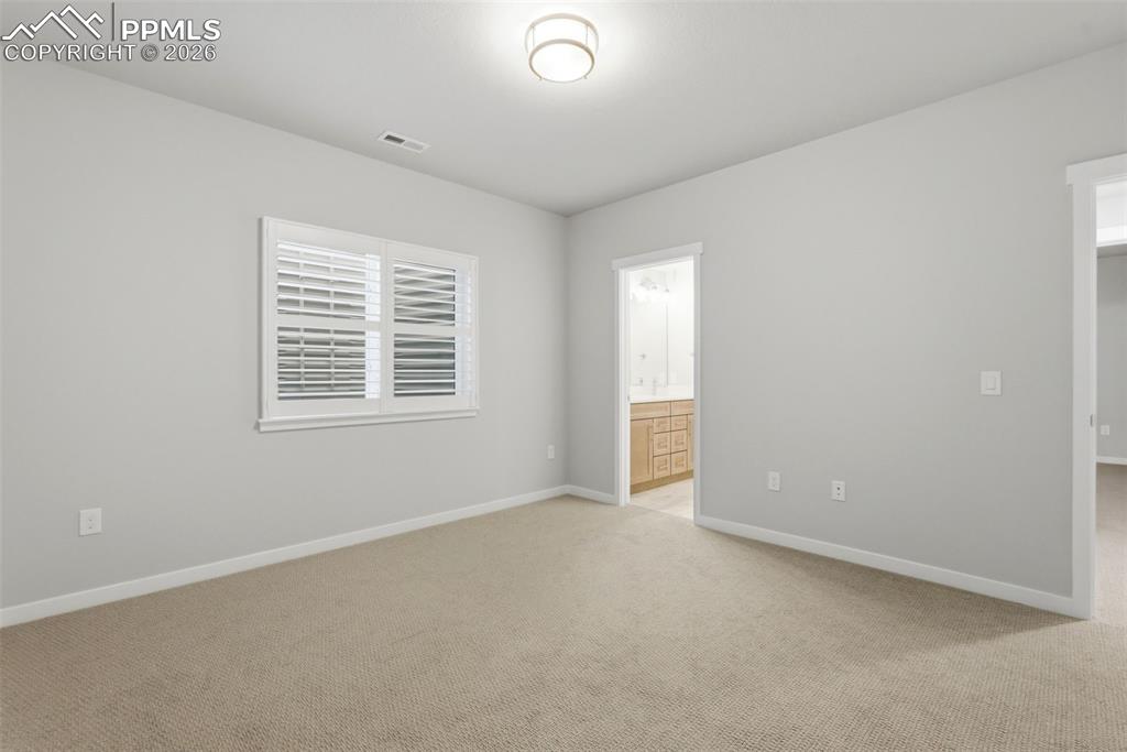 Image 35 of 48: Additional basement bedroom with carpet flooring, recessed lighting, and la