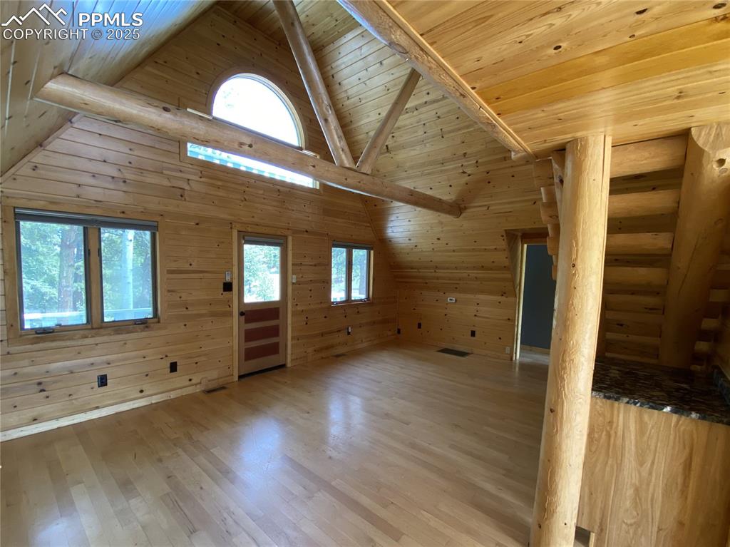 Image 16 of 36: The open living room allows room for entertaining