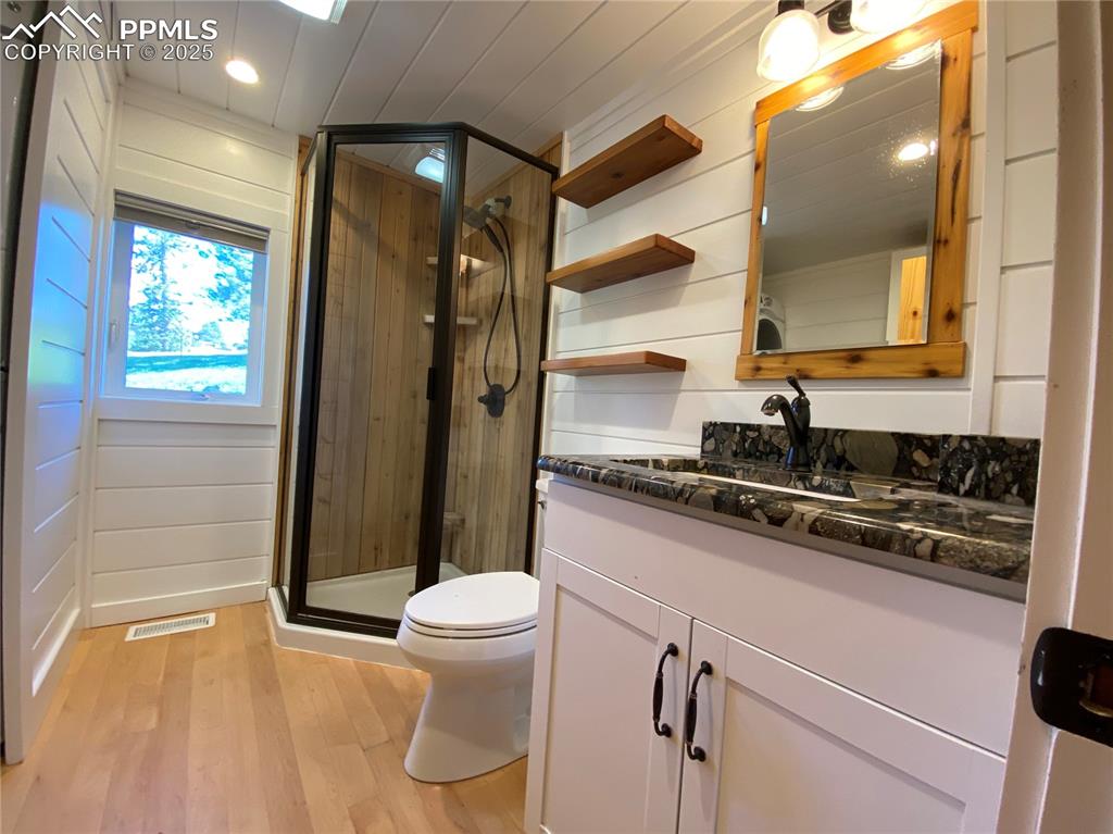 Image 18 of 36: And doubles as a 3/4 bathroom