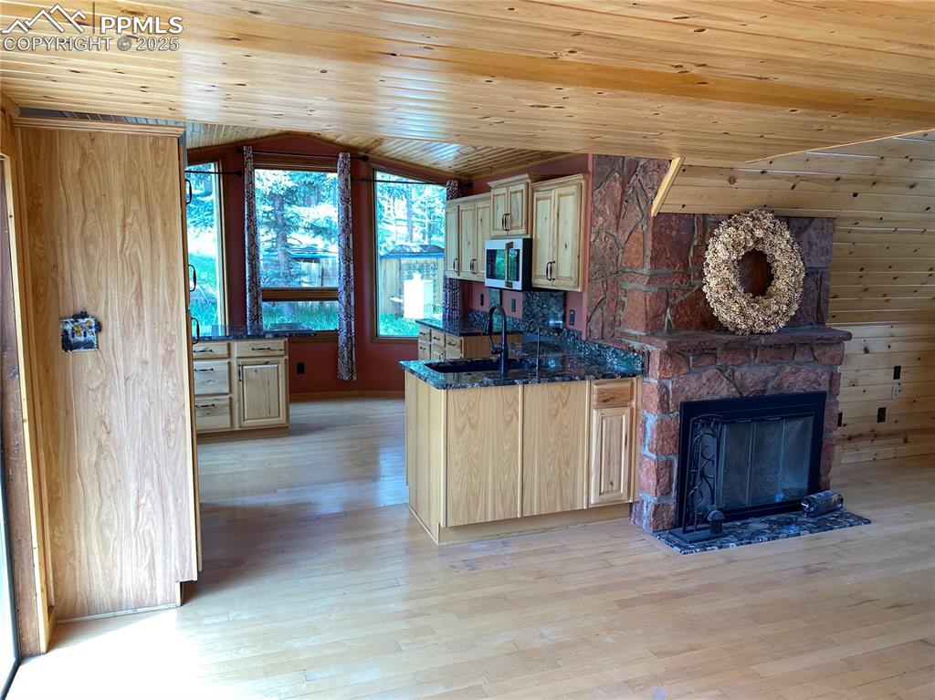 Image 19 of 36: The Kitchen features a dine in breakfast nook