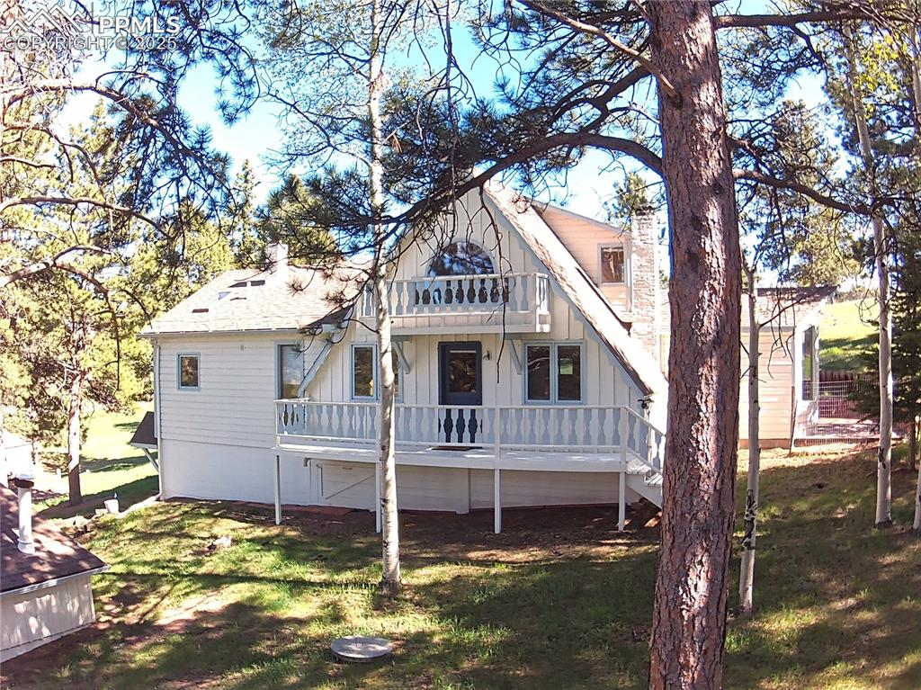 Image 2 of 36: Nestled on OVER 5 ACRES of rural property