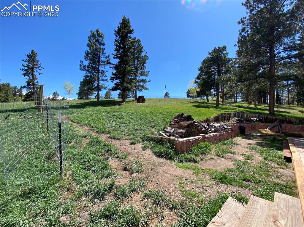 Image 27 of 36: Additional fencing provides a smaller (but still huge) dog run area