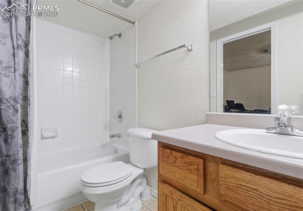 Image 12 of 15: Full bathroom in basement
