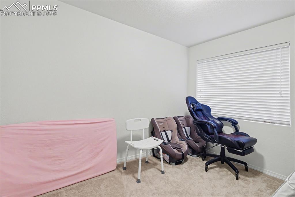 Image 13 of 15: Bedroom #3 is in the basement.  There is a window & closet.  Currently bein