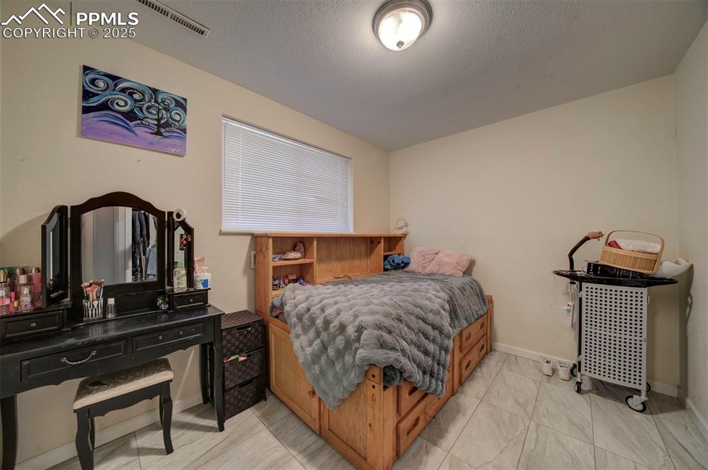 Image 44 of 50: Bedroom