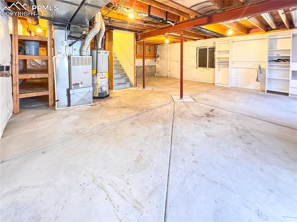 Image 38 of 50: Unfinished basement