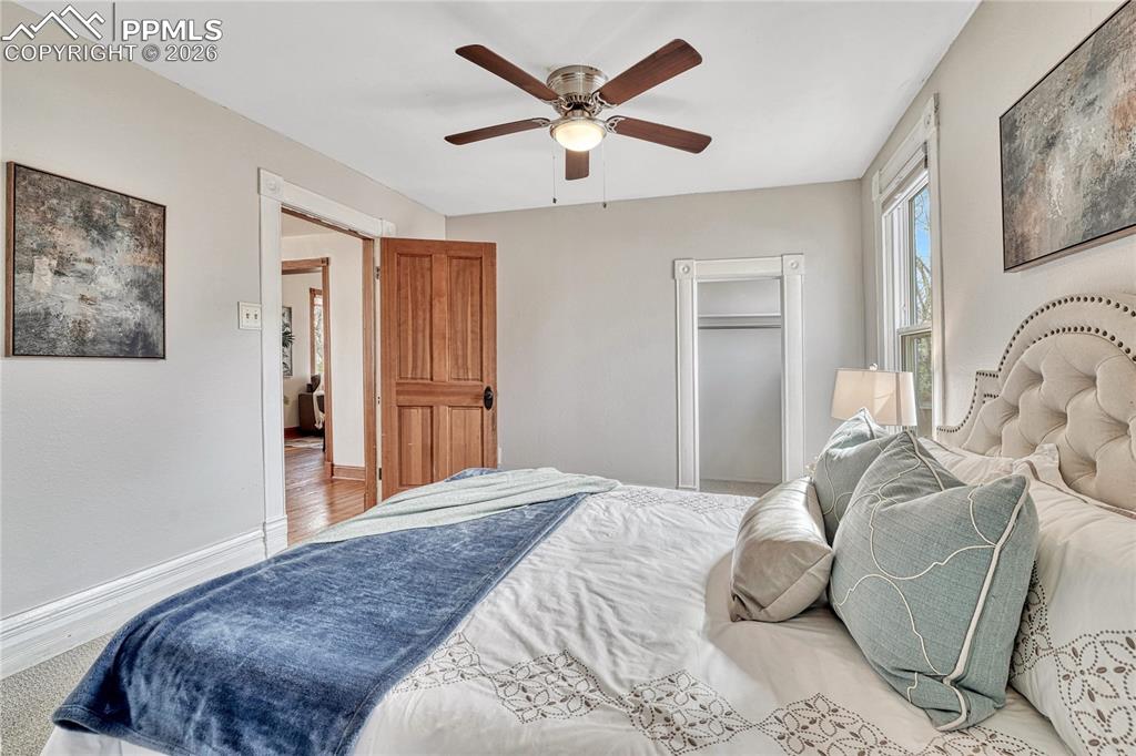 Image 16 of 42: The primary suite features a convenient ceiling fan for comfortable climate