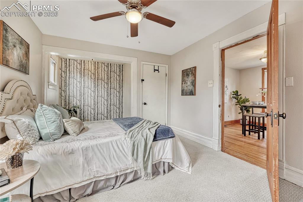 Image 18 of 42: Second door in the bedroom provides access to the crawlspace