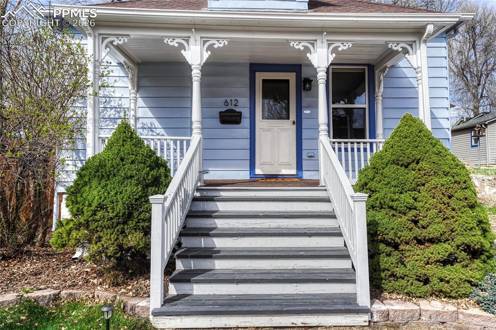 Image 2 of 42: The home welcomes you with fantastic curb appeal, showcasing gorgeous archi