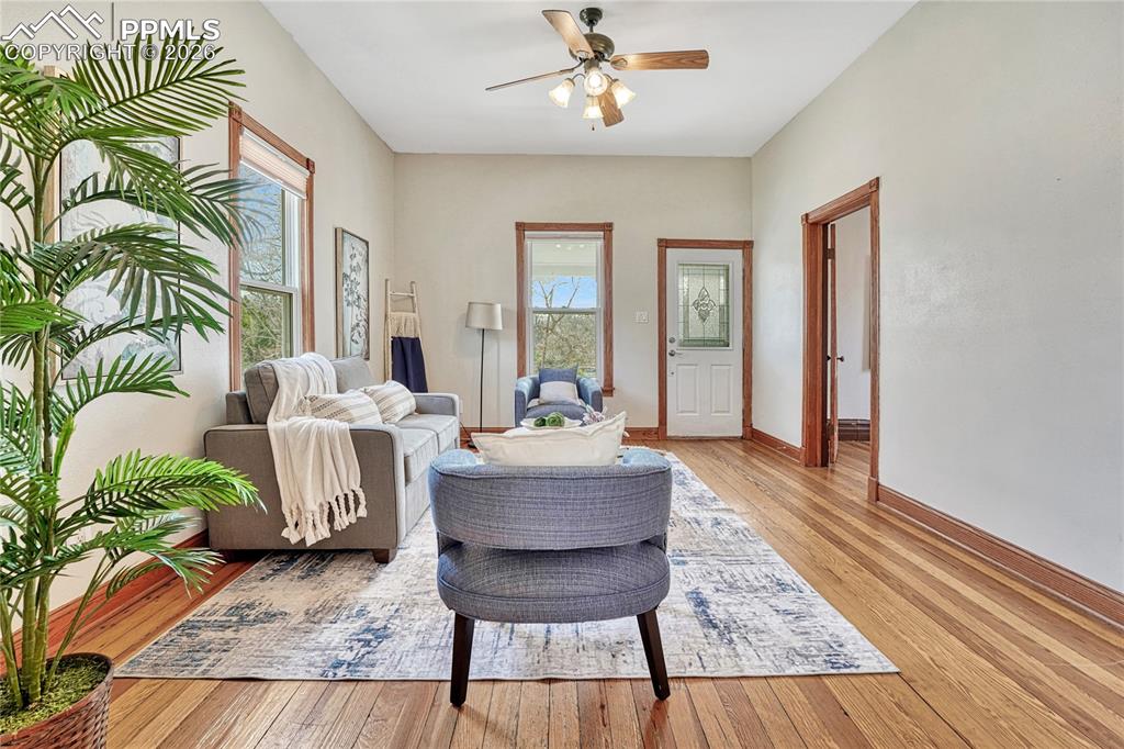 Image 4 of 42: Soft natural light fills the generously sized living room, highlighting the