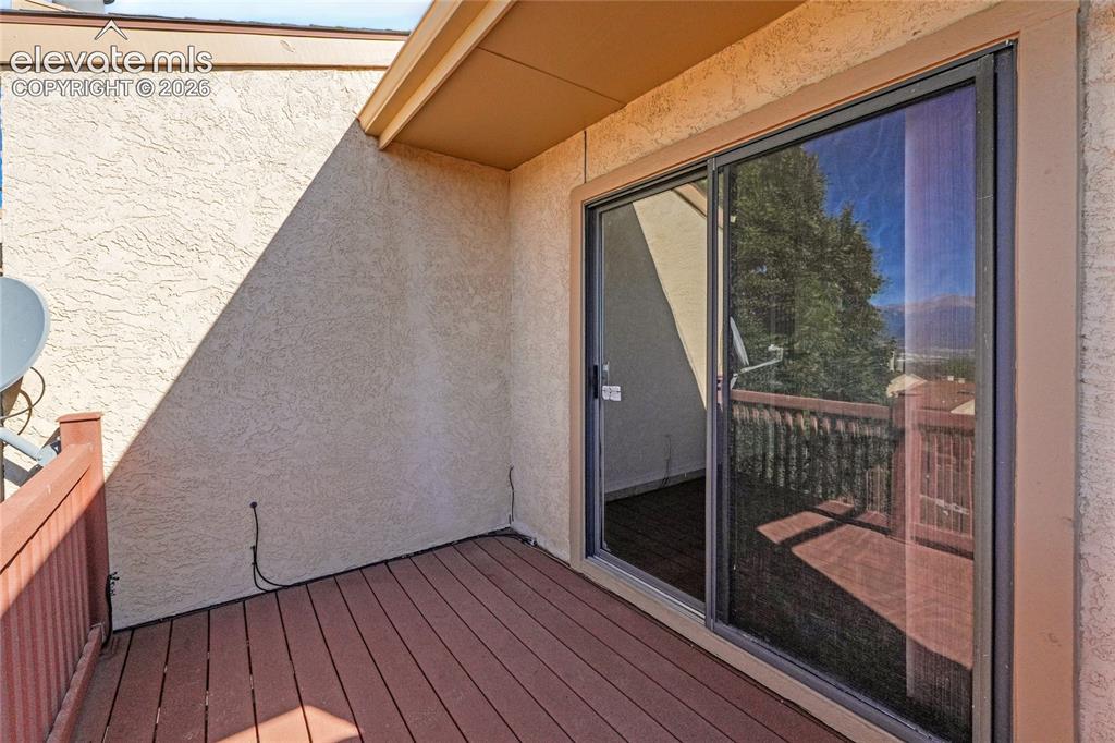 Image 14 of 33: Deck from primary ensuite