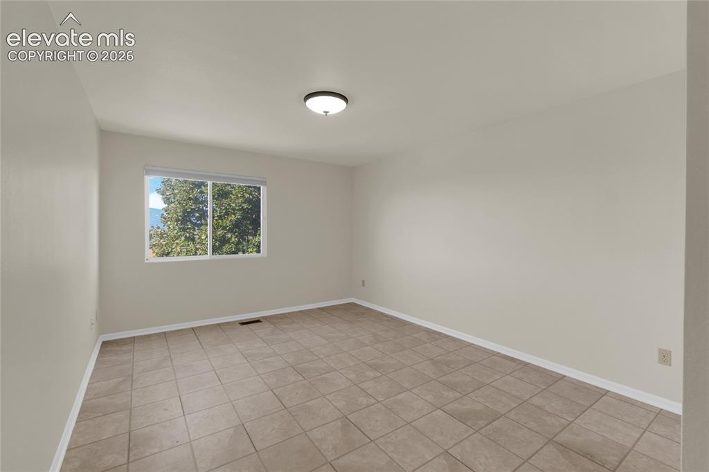 Image 17 of 33: Second bedroom ensuite upper level