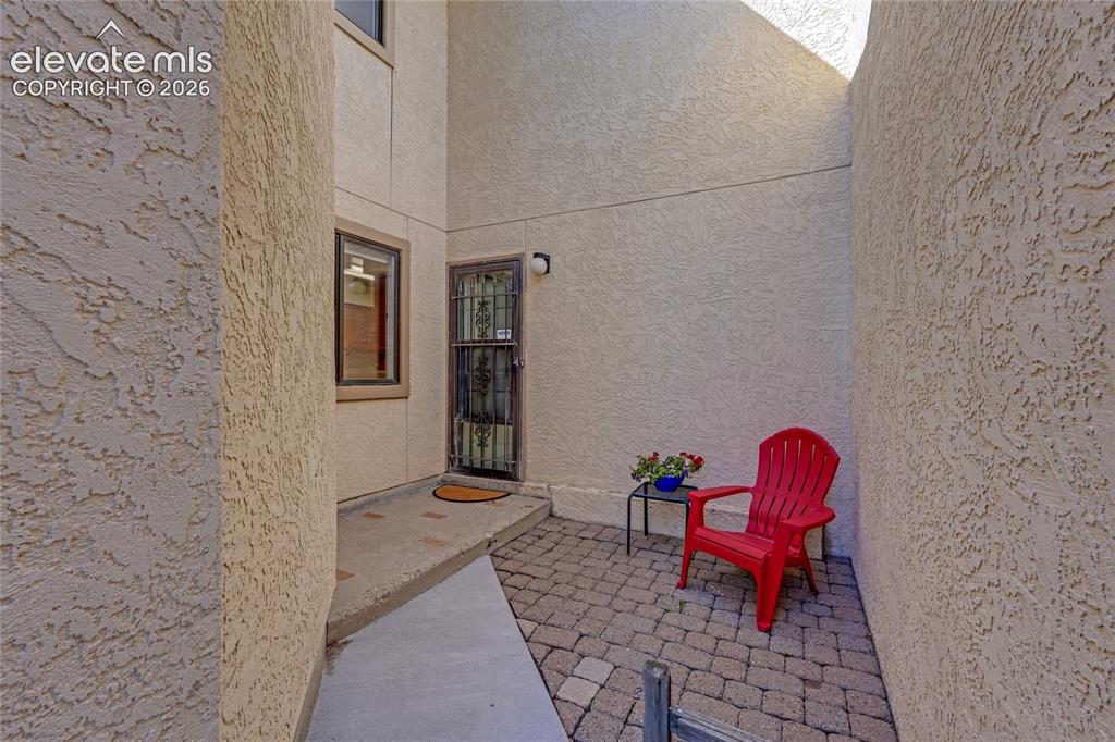 Image 2 of 33: Private entrance and courtyard