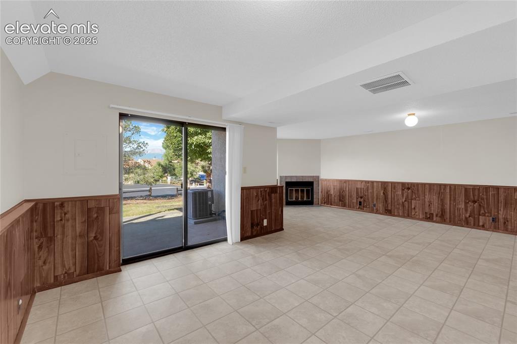Image 20 of 33: Great flex space in basement with walk out to patio