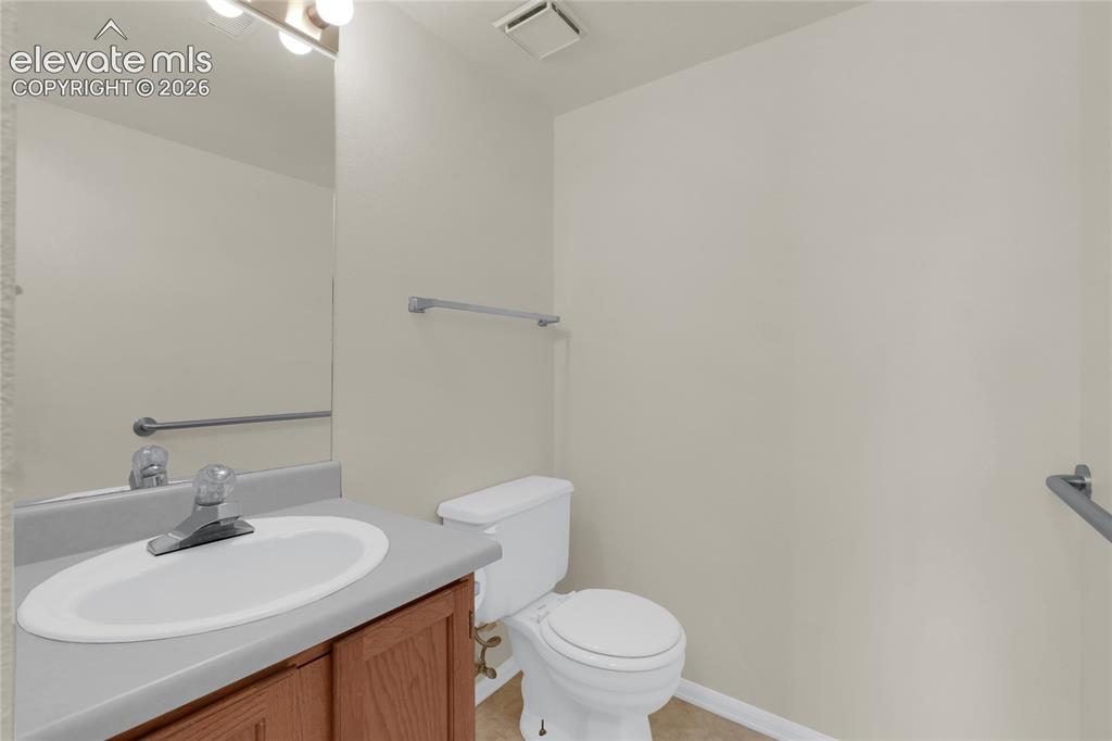 Image 23 of 33: Bathroom in basement