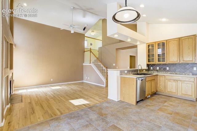 Image 11 of 48: Kitchen looking into Great Room