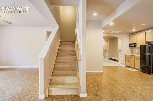 Image 17 of 48: Stairs to Basement