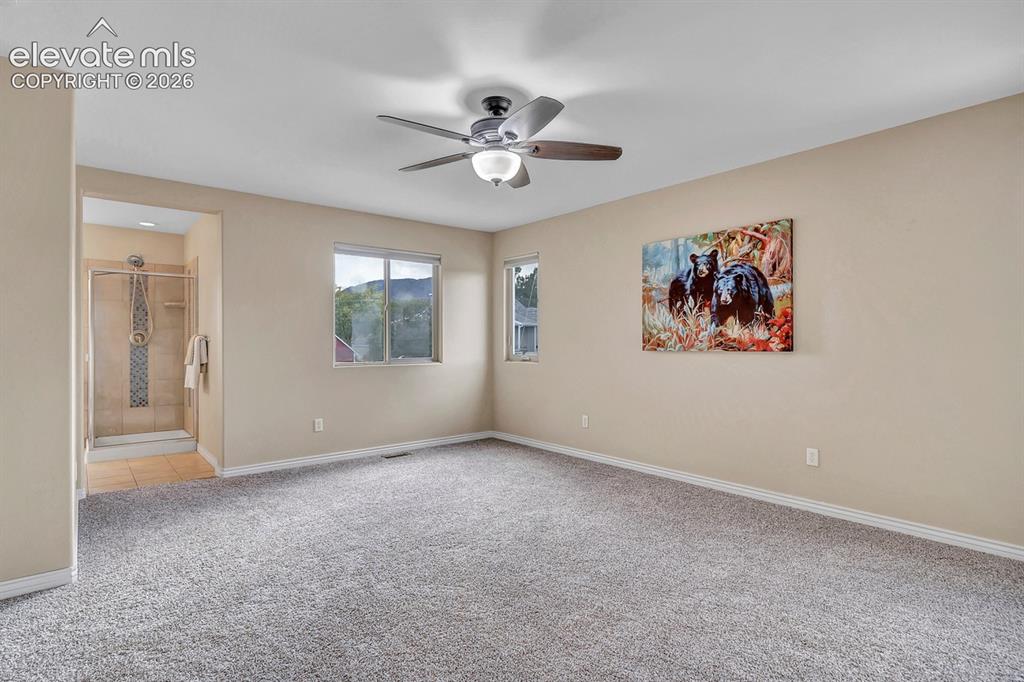 Image 17 of 46: Upper level Primary Bedroom