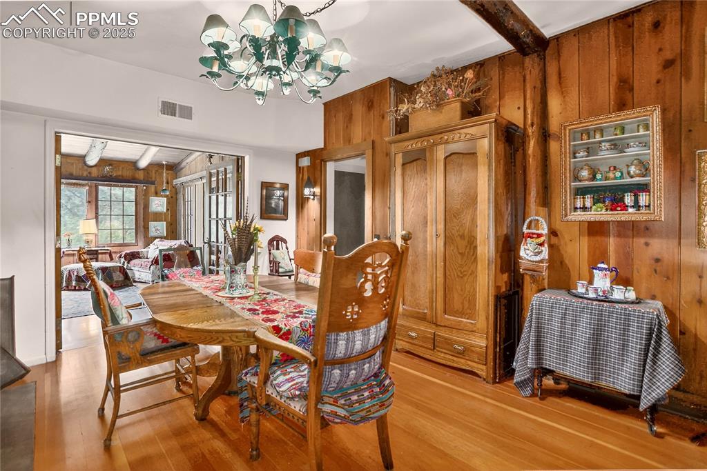Image 23 of 41: Dining room with French doors