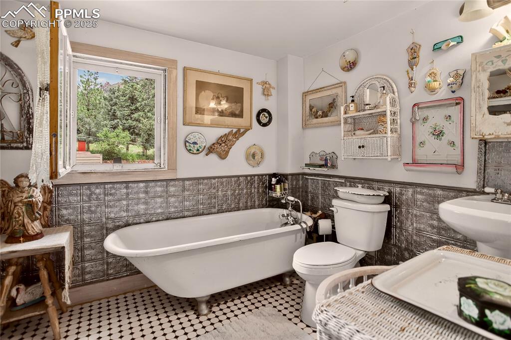 Image 37 of 41: Full bath - upper level w/ clawfoot tub
