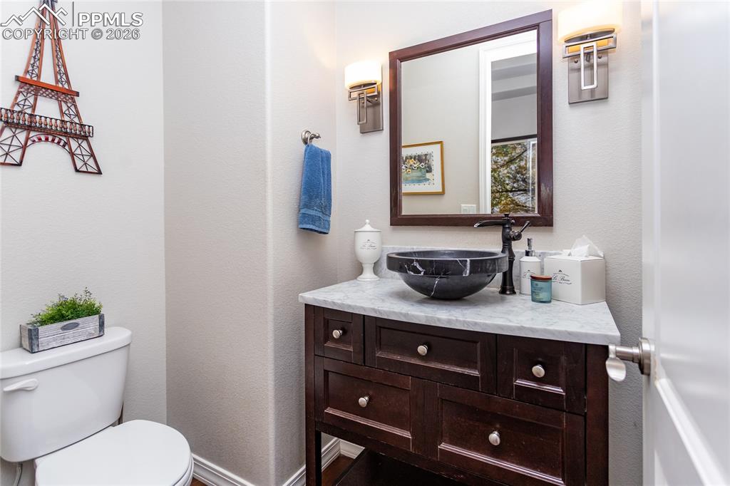 Image 11 of 50: Main level half bathroom for your guests