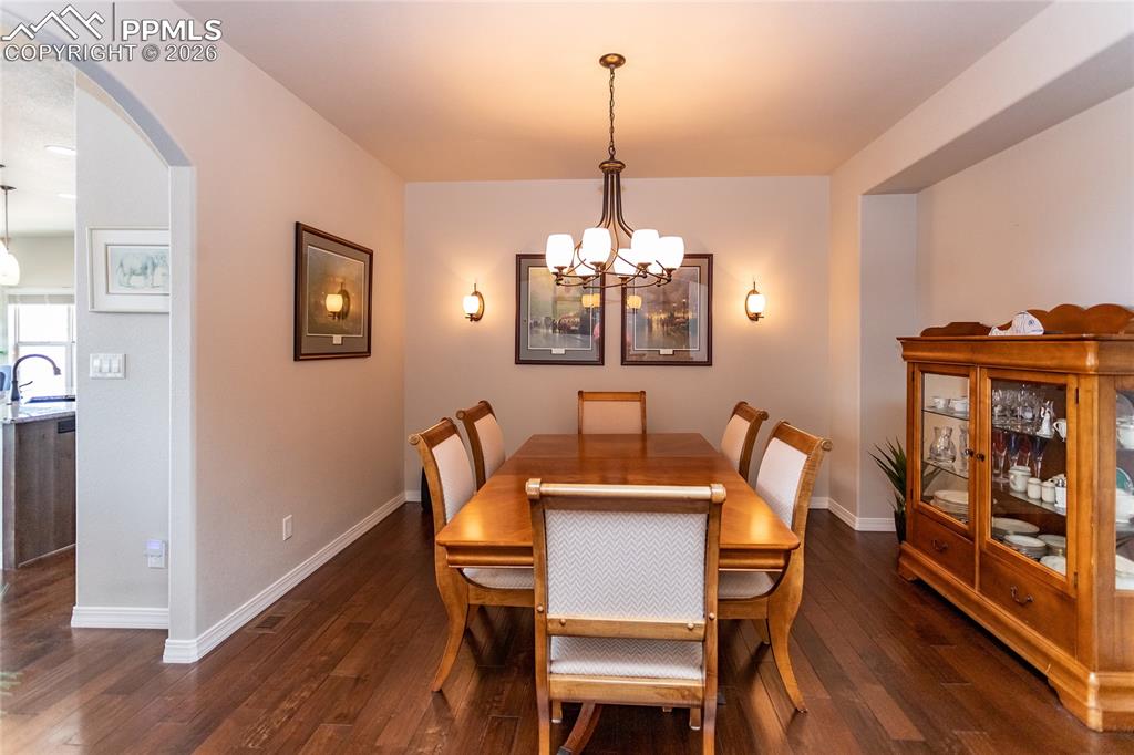 Image 12 of 50: Large Formal Dining Room offering plenty of space for your gatherings