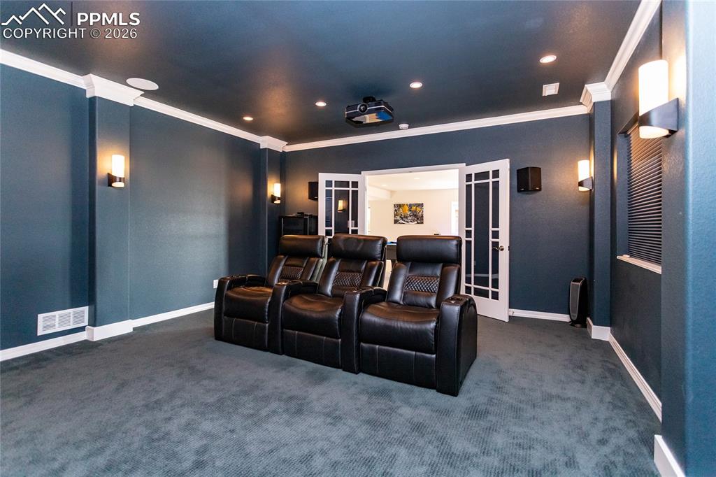 Image 35 of 50: Kick back and enjoy your favorite movies or shows in plush, theater-style s