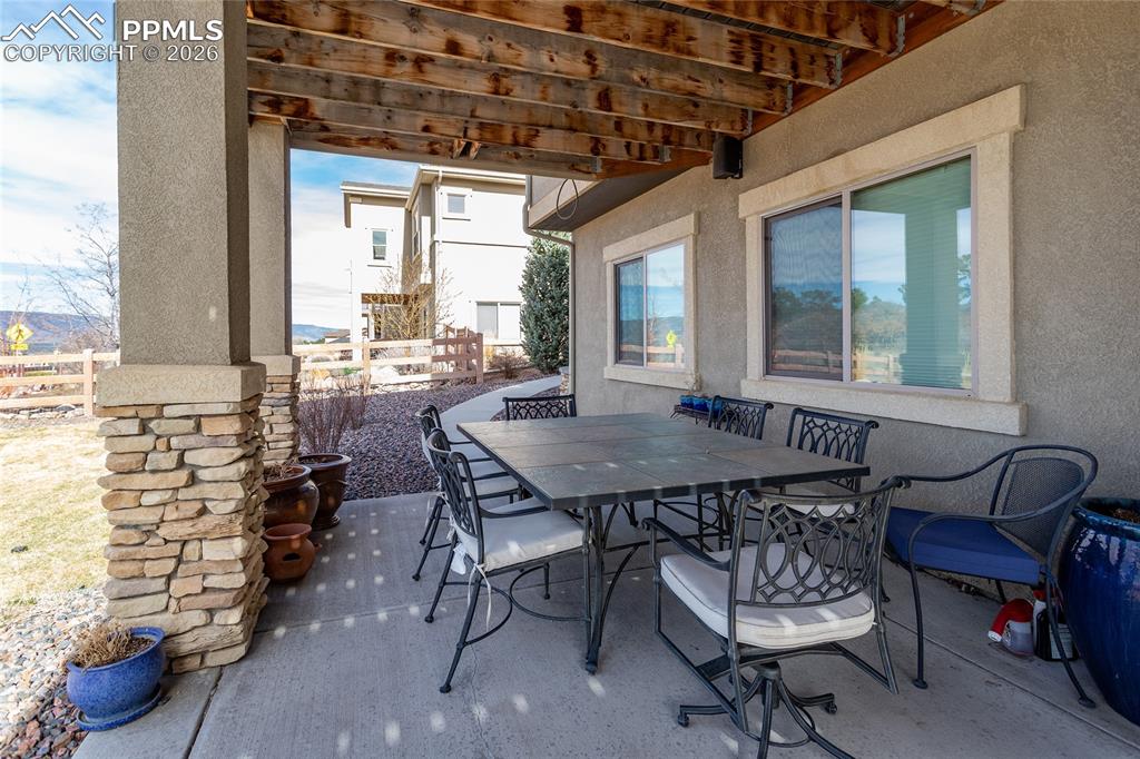 Image 47 of 50: So many different entertaining areas are offered in the backyard/patio area