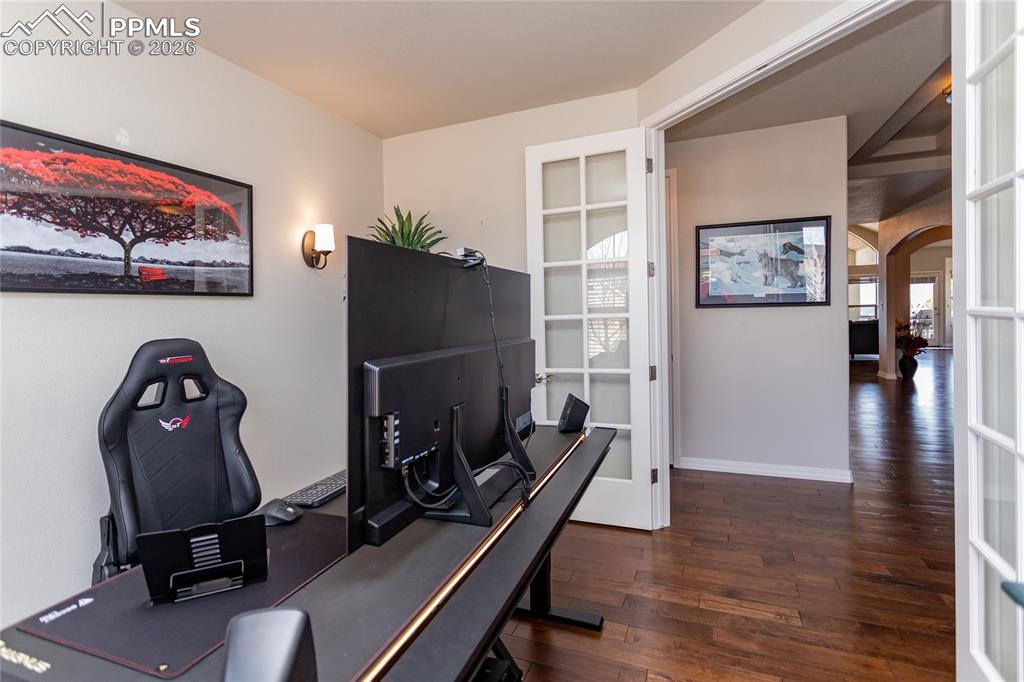 Image 5 of 50: Office with French doors to leave open or provide privacy