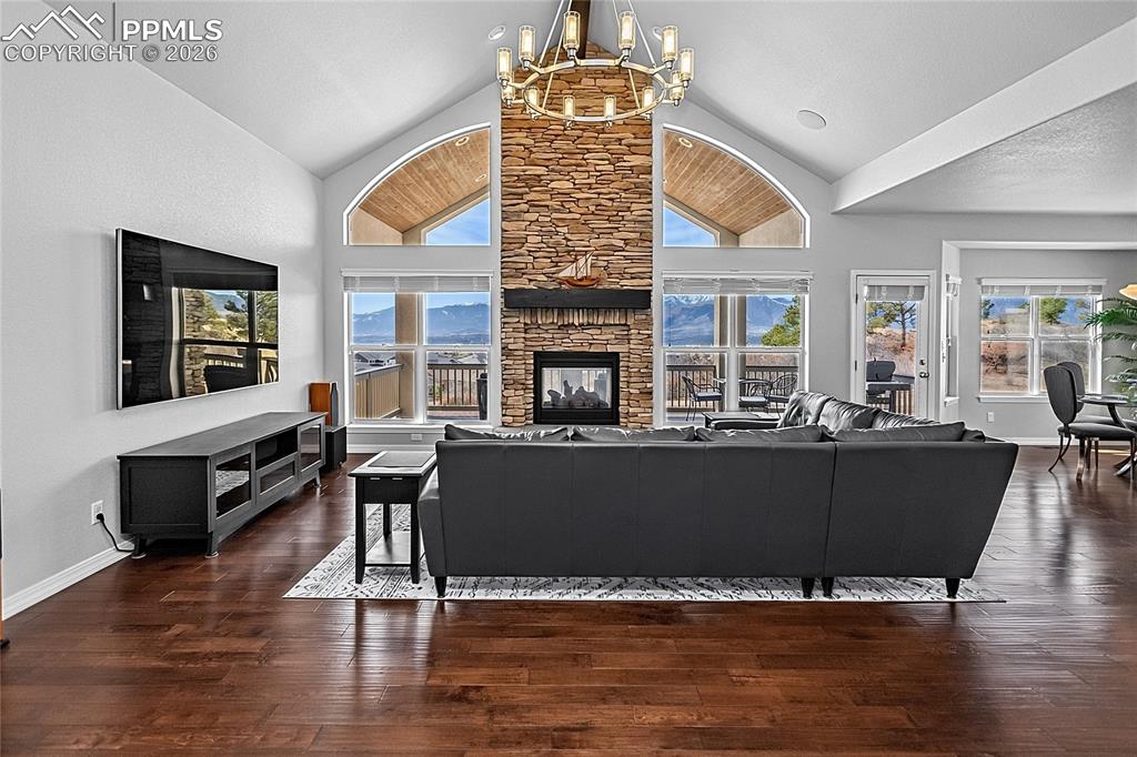 Image 8 of 50: Stunning Great Room with spectacular mountain views with an open floor conc