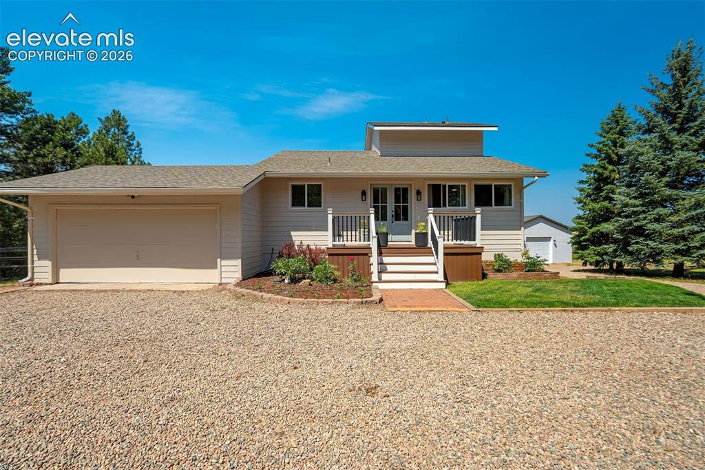 Caption: Walden residence on 1.46 acres with a huge workshop, greenhouse, and chicken coop.  New roof, new si
