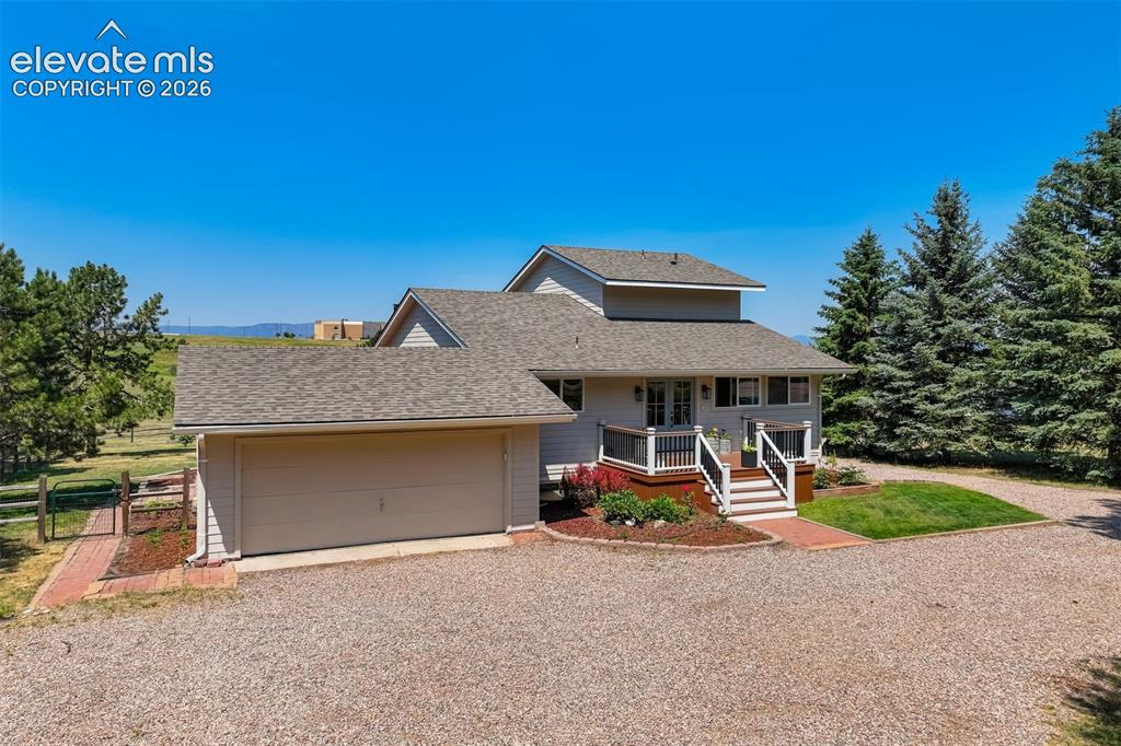 Image 3 of 50: Walden residence on 1.46 acres with a huge workshop, greenhouse, and chicke