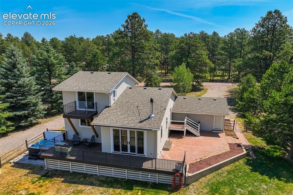 Image 4 of 50: Walden residence on 1.46 acres with a huge workshop, greenhouse, and chicke