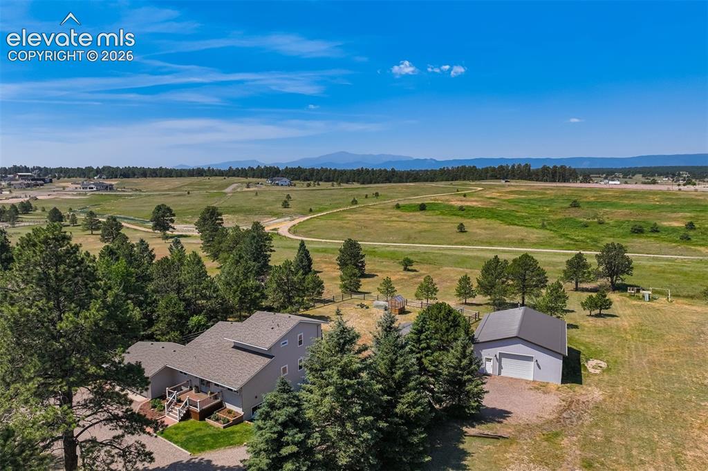 Image 5 of 50: Walden residence on 1.46 acres with a huge workshop, greenhouse, and chicke