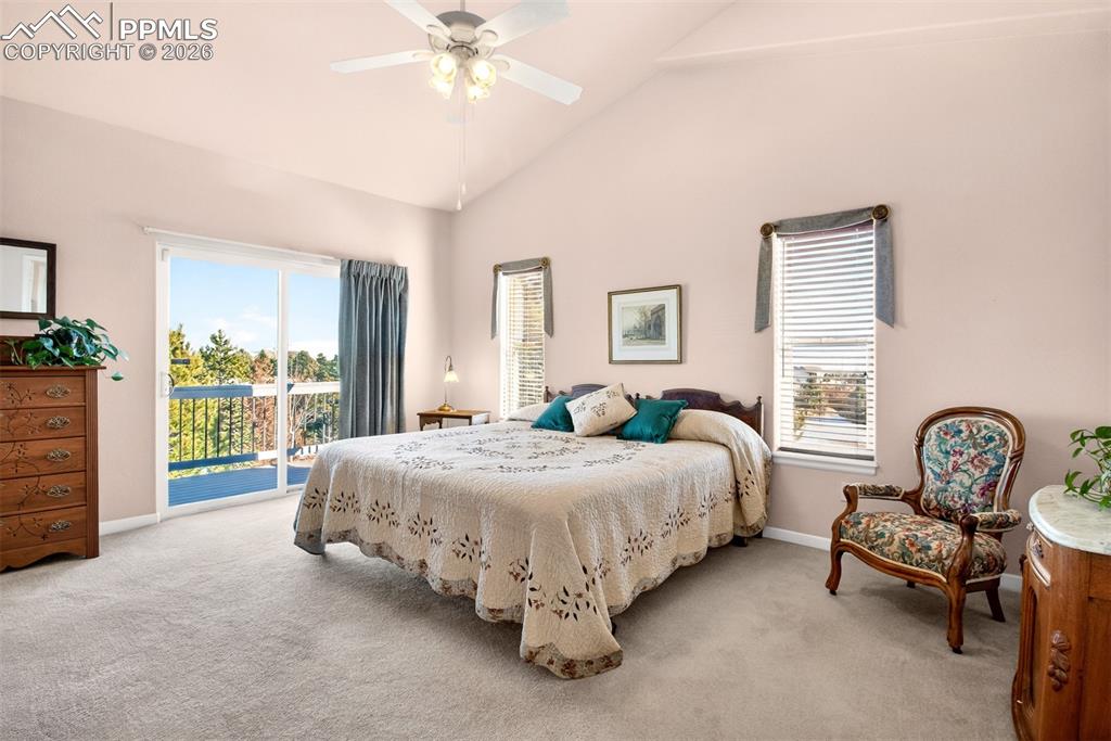 Image 14 of 49: Master Bedroom With Vaulted Ceiling, Private Deck Overlooking The Back Yard