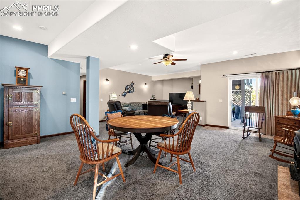 Image 33 of 49: Family Room Walk-Out, Gas Stove On The Right.