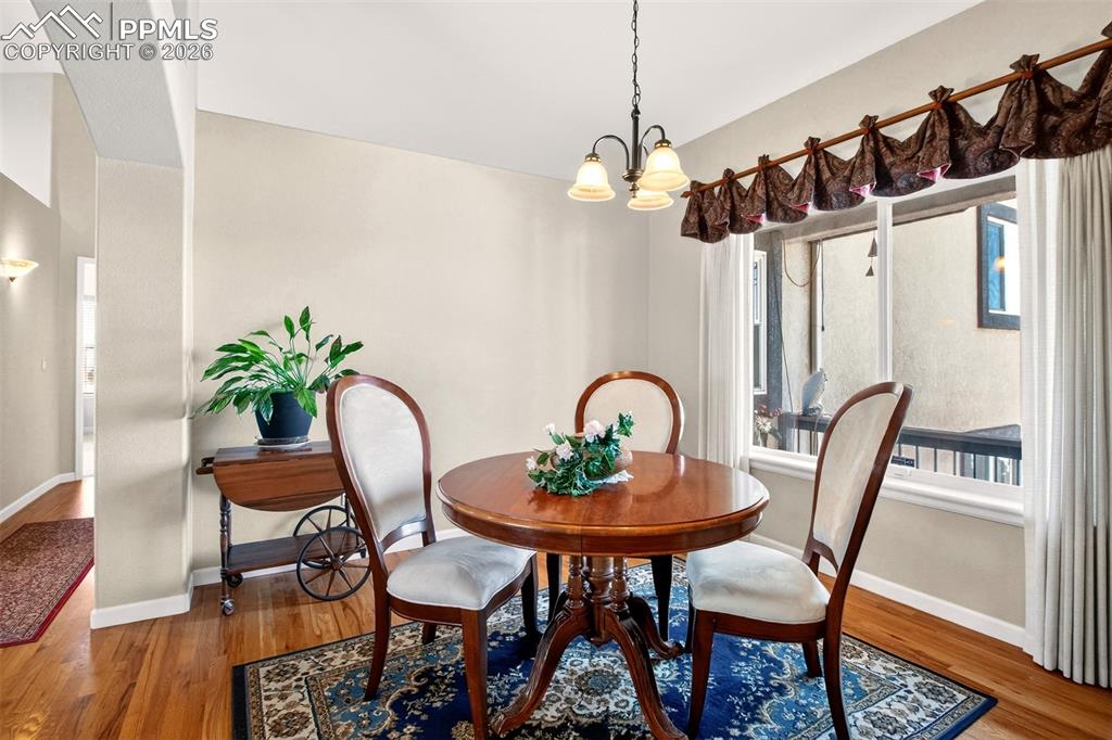 Image 7 of 49: Formal Dining Room With Mountain Views.