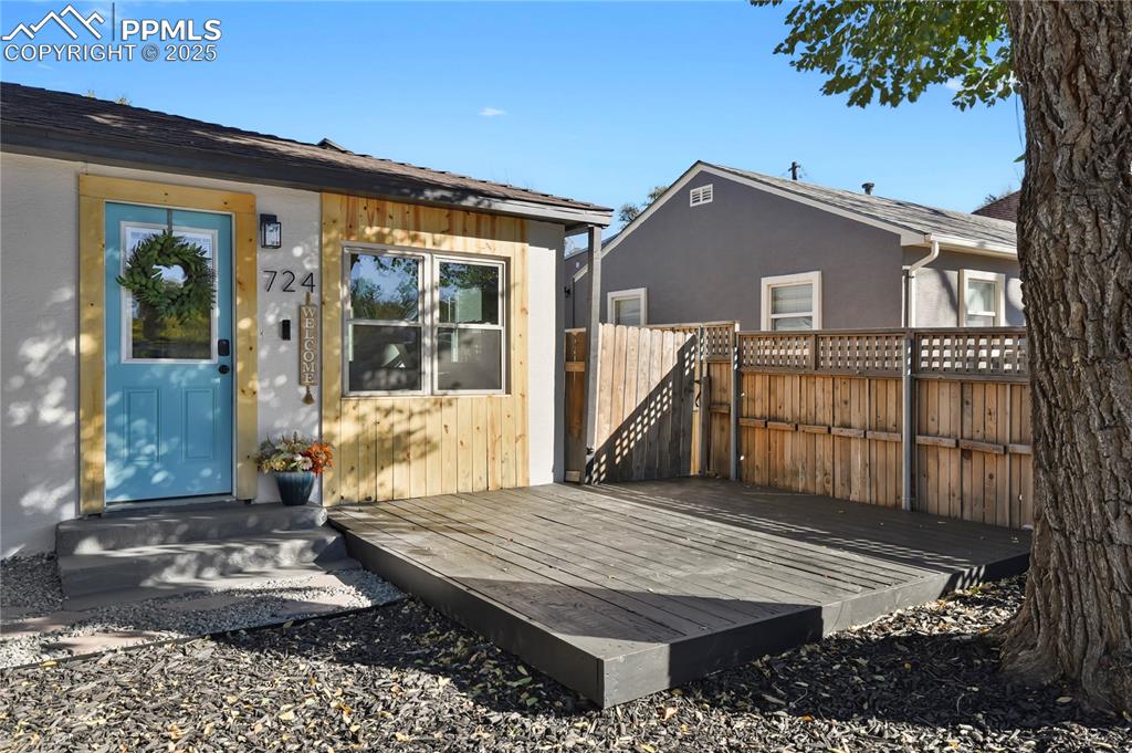 Caption: Charming front porch and deck