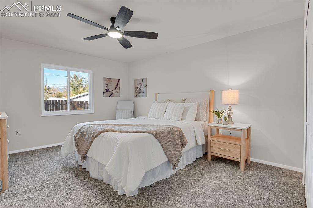 Image 11 of 24: Spacious primary bedroom with en-suite bath