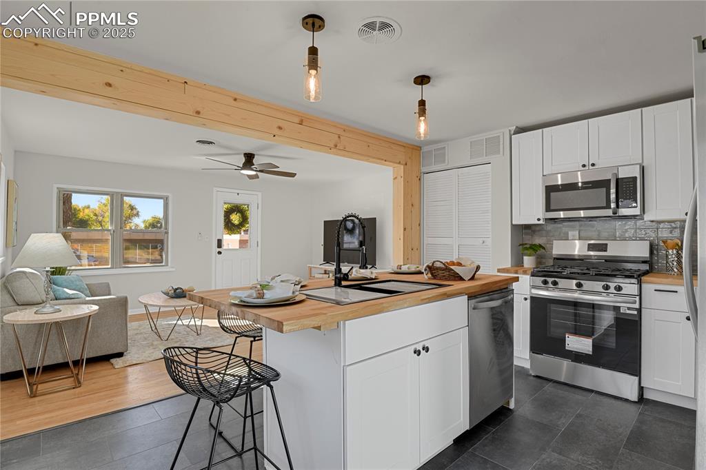 Image 9 of 24: Stainless appliances