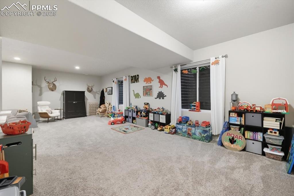Image 27 of 47: Game room featuring carpet flooring and recessed lighting